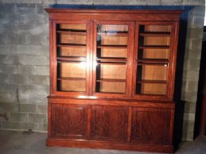 Antique and Important Charles X Bookcase in Mahogany and Mahogany Feather